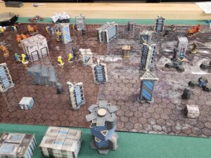 A wide shot of most of the board state. From left to right: Bushwacker, Hatchetman, Nightsky, Berserker (top), Hatchetman (bottom), Commando (top), Wolfhound (bottom).